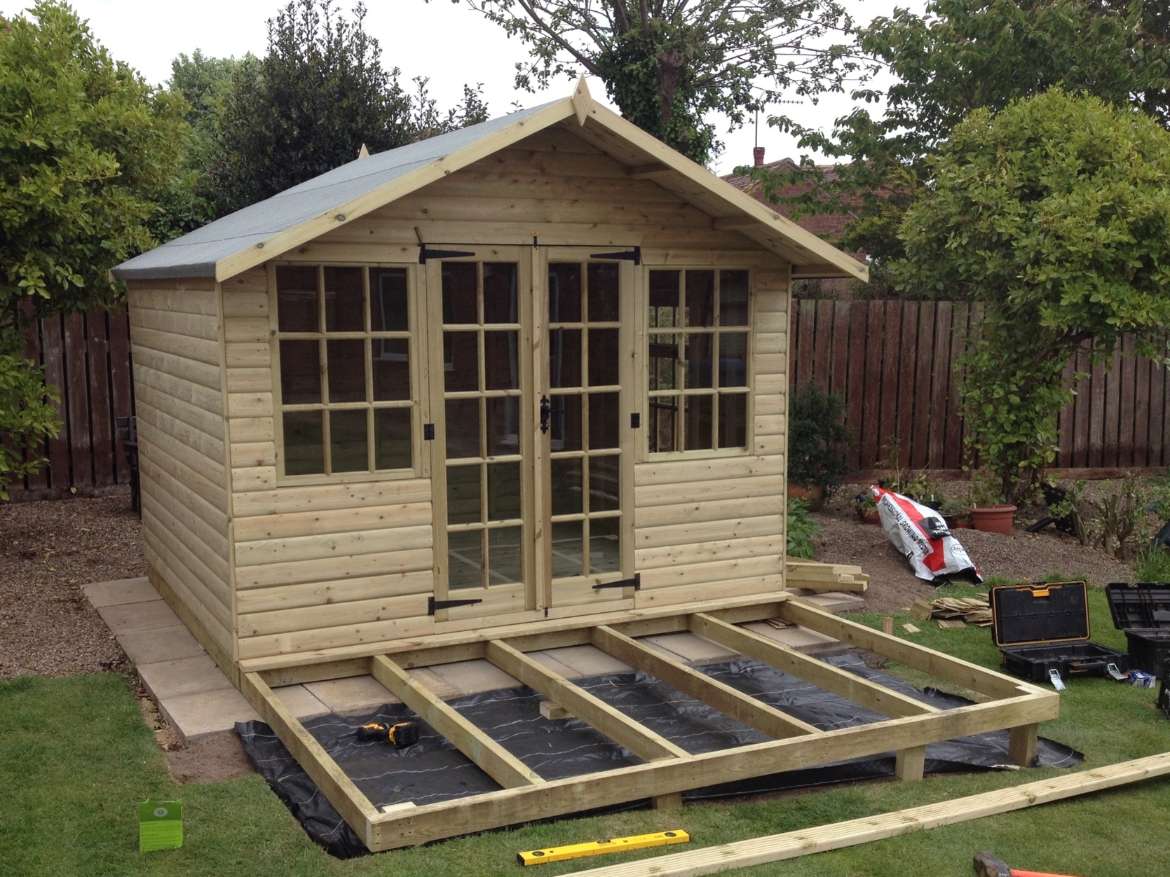 A brand new shed in a garden