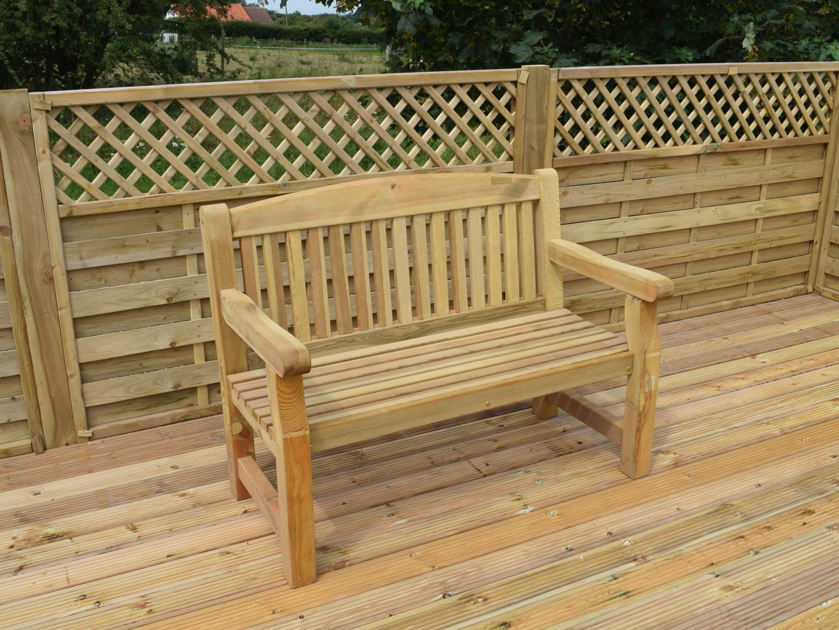 A wooden bench on decking