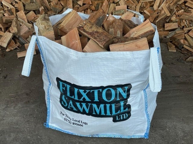 A Flixton Sawmill bag full of logs