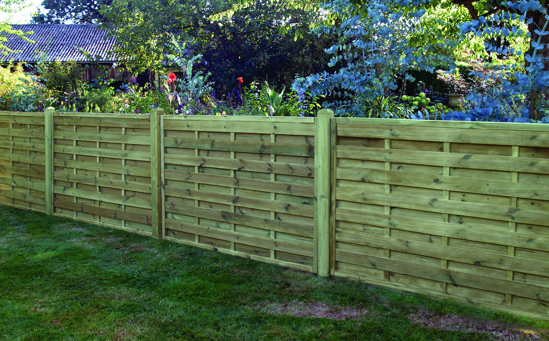 A fence in a garden on a summer's day